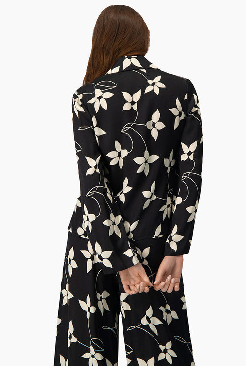 Blusa camisera negra estampada con mangas largas y botones