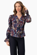 Blusa estampada de escote V con botones y mangas largas