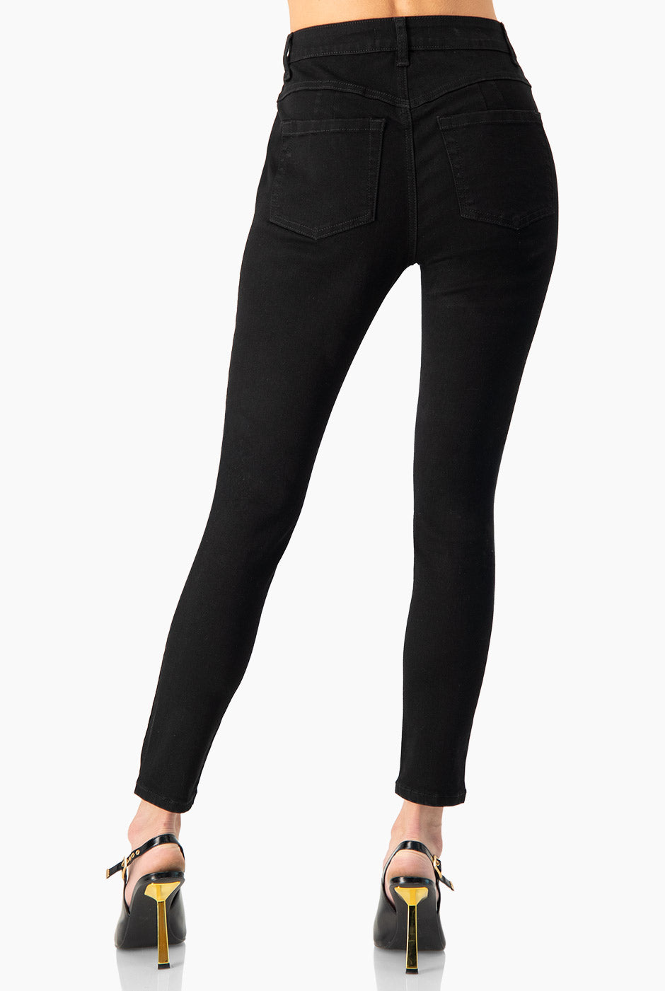 Jeans skinny negros con bolsillos y botón frontal